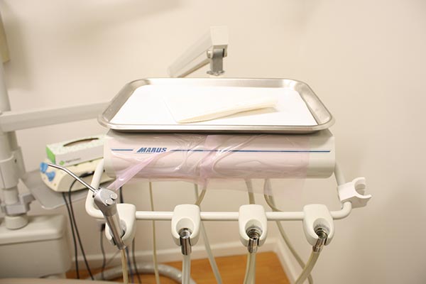 A collection of dental tools that might be used in a routine cleaning or examination in New York, NY